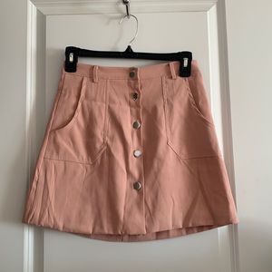 Pink skirt with buttons